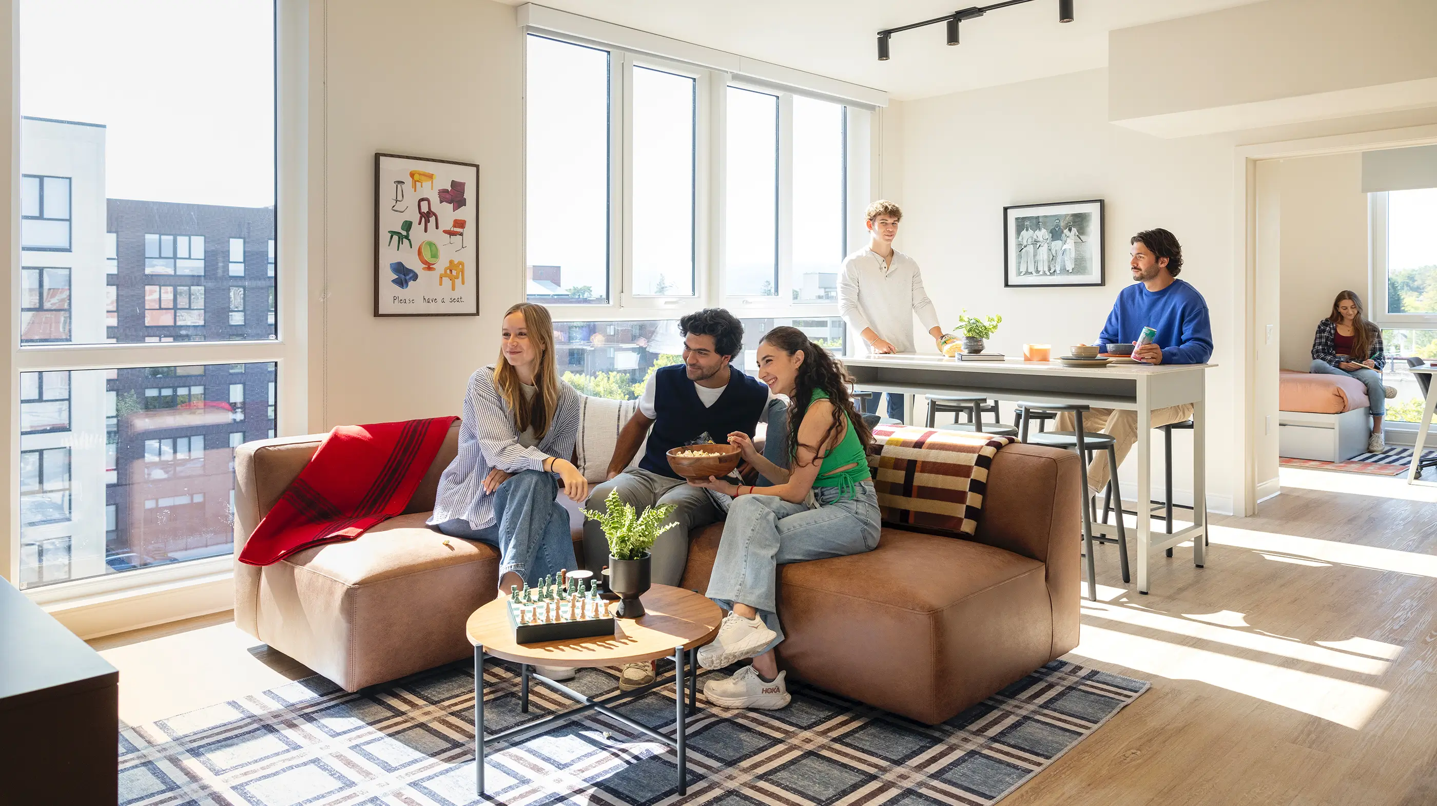 a group of friends sitting on a couch