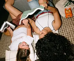 two women reading books